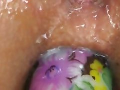violet dildo in a asian butt