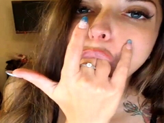 Provoking brunette babe fingers her mouth and blows a dick
