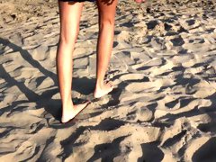 Following her sexy feet on the beach