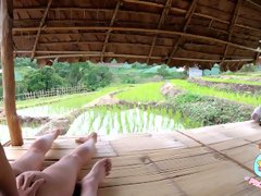 Thai couple have sex outside the hut.