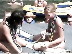 Girls eat pussy for an audience at lake party